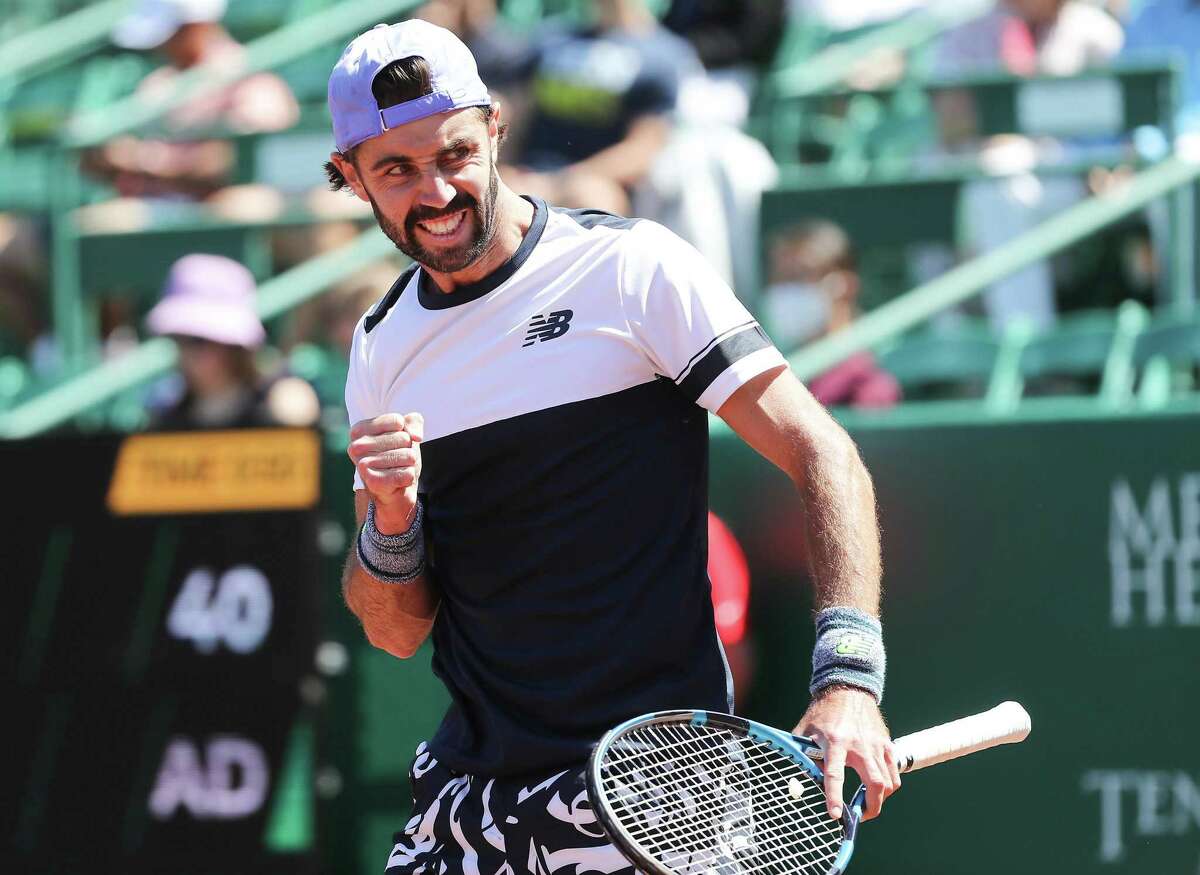 Jordan Thompson, AUS, reacts to winning the first match against Christian Garin, CHI, in the second round of the Fayez Sarofim & Co. U.S. Men’s Clay Court Championship at River Oaks Country Club in Houston on Thursday, April 7, 2022.
