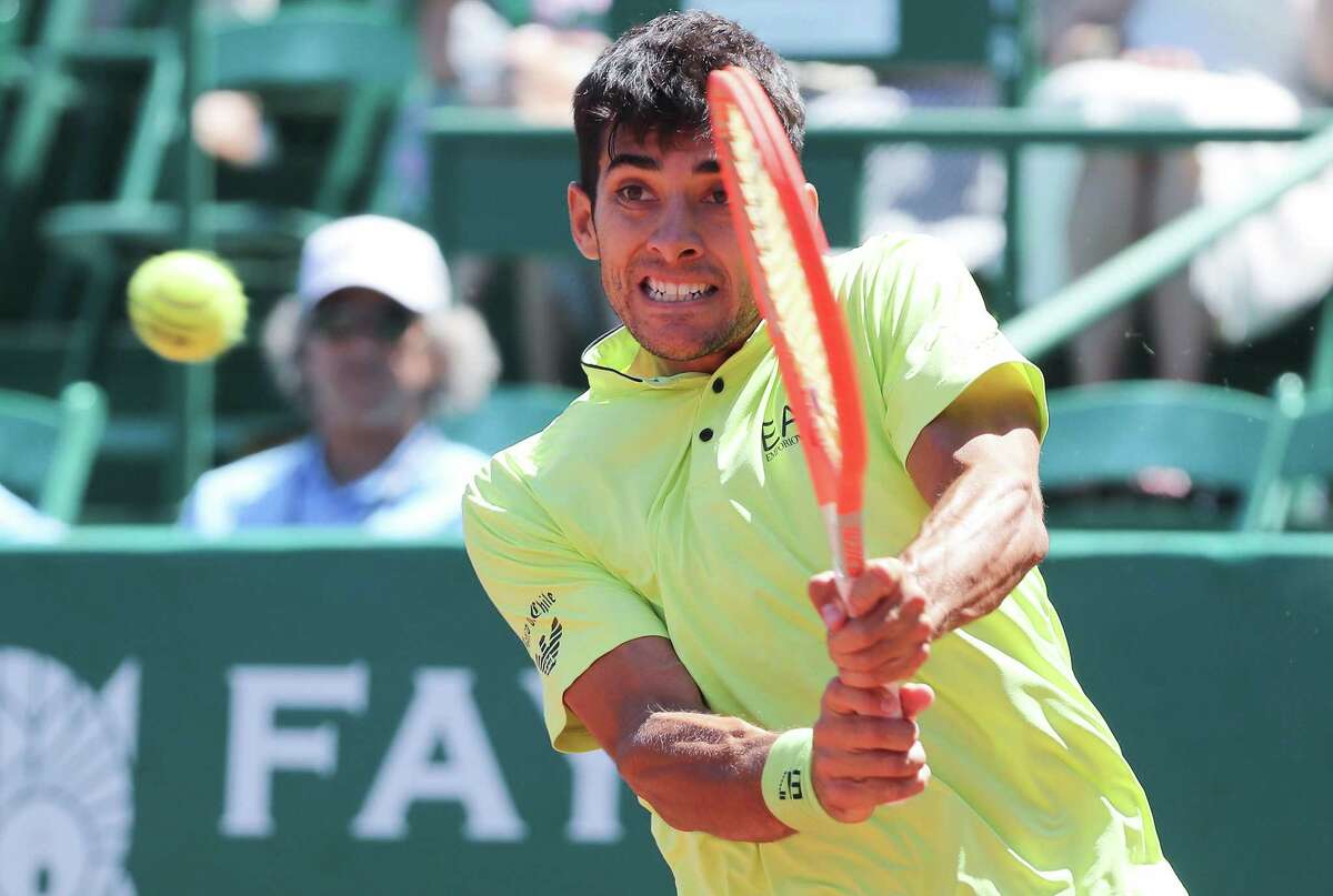 Christian Garin, CHI, returns a hit to Jordan Thompson, AUS during the second round of the Fayez Sarofim & Co. U.S. Men’s Clay Court Championship at River Oaks Country Club in Houston on Thursday, April 7, 2022.