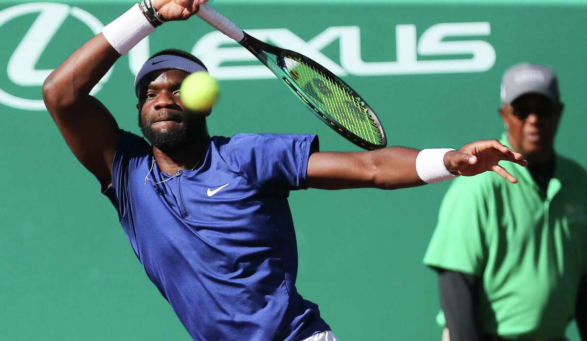 Frances Tiafoe, USA, returns a serve by Pablo Cuevas, URU, during the second round of the Fayez Sarofim & Co. U.S. Men’s Clay Court Championship at River Oaks Country Club in Houston on Thursday, April 7, 2022.