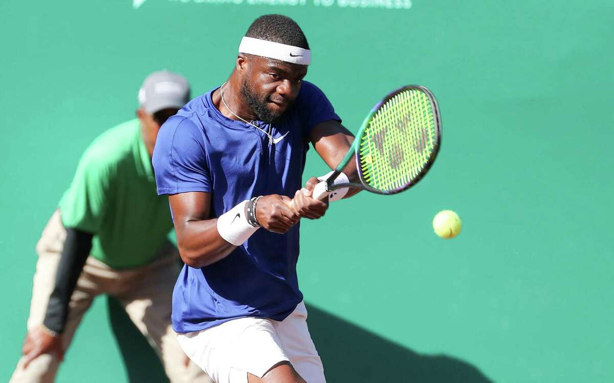 Frances Tiafoe, USA, returns a hit by Pablo Cuevas, URU, during the second round of the Fayez Sarofim & Co. U.S. Men’s Clay Court Championship at River Oaks Country Club in Houston on Thursday, April 7, 2022.