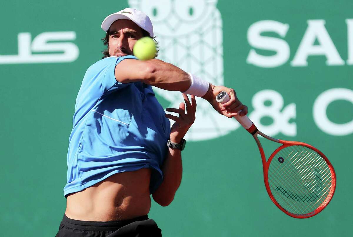 Pablo Cuevas, URU, returns a serve by France Tiafoe, USA, in the second round of the Fayez Sarofim & Co. U.S. Men’s Clay Court Championship at River Oaks Country Club in Houston on Thursday, April 7, 2022.