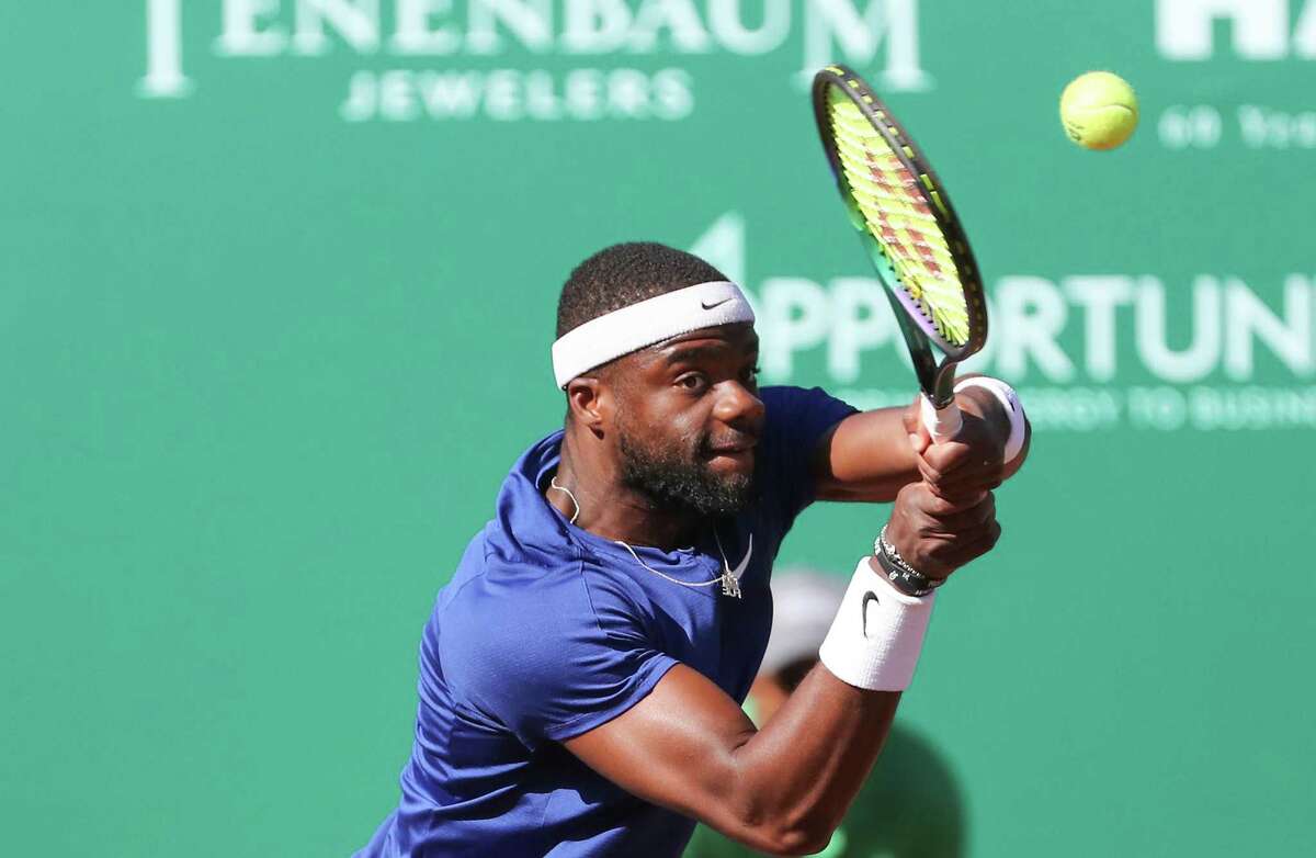 Frances Tiafoe, USA, returns a serve by Pablo Cuevas, URU, during the second round of the Fayez Sarofim & Co. U.S. Men’s Clay Court Championship at River Oaks Country Club in Houston on Thursday, April 7, 2022.