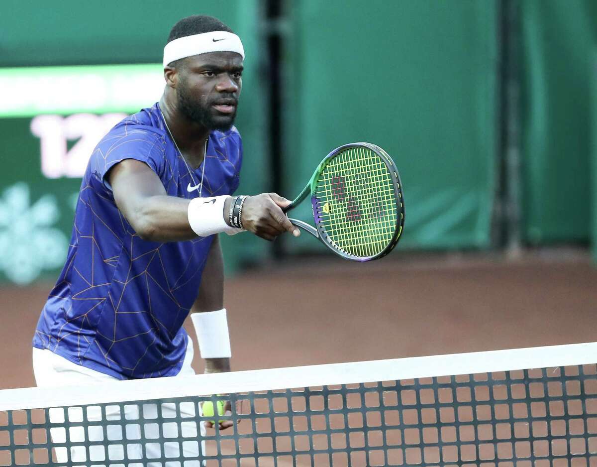 France Tiafoe, USA, contest an out call to his serve against Pablo Cuevas, URU, in the second round of the Fayez Sarofim & Co. U.S. Men’s Clay Court Championship at River Oaks Country Club in Houston on Thursday, April 7, 2022. Tiafoe won in a 3rd set tie breaker.