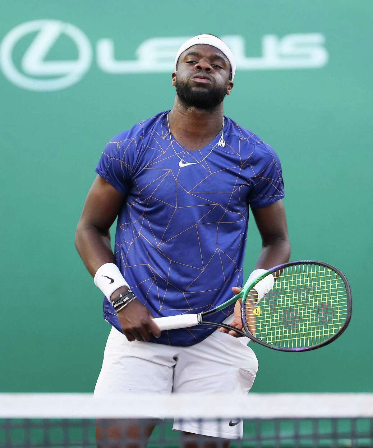 France Tiafoe, USA, reacts to losing a point against Pablo Cuevas, URU, during the second round of the Fayez Sarofim & Co. U.S. Men’s Clay Court Championship at River Oaks Country Club in Houston on Thursday, April 7, 2022. Tiafoe won in a 3rd set tie breaker.
