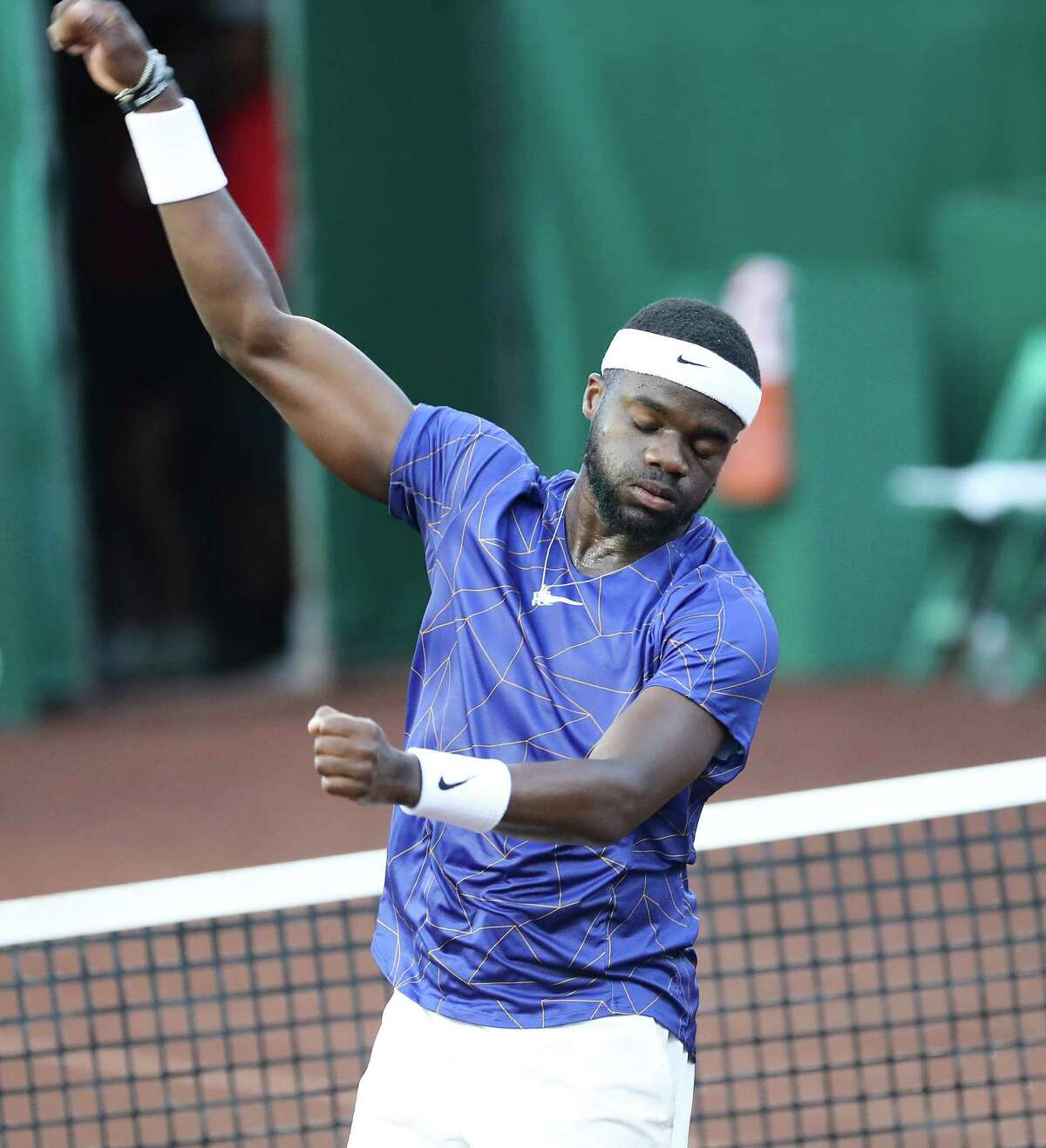 France Tiafoe, USA, reacts to defeating Pablo Cuevas, URU in the second round of the Fayez Sarofim & Co. U.S. Men’s Clay Court Championship at River Oaks Country Club in Houston on Thursday, April 7, 2022. Tiafoe won in a 3rd set tie breaker.