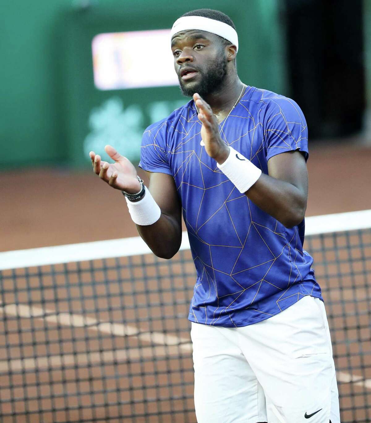 France Tiafoe, USA, reacts to defeating Pablo Cuevas, URU in the second round of the Fayez Sarofim & Co. U.S. Men’s Clay Court Championship at River Oaks Country Club in Houston on Thursday, April 7, 2022. Tiafoe won in a 3rd set tie breaker.