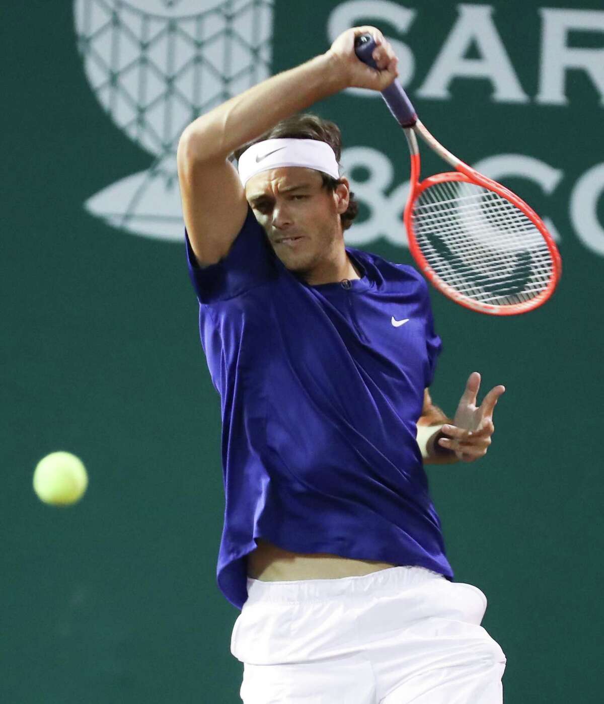 Taylor Fritz, USA, returns a hit from Alejandro Tabilo, CHI, during the second round of the Fayez Sarofim & Co. U.S. Men’s Clay Court Championship at River Oaks Country Club in Houston on Thursday, April 7, 2022. Fritz won the match 6-1, 6-4.