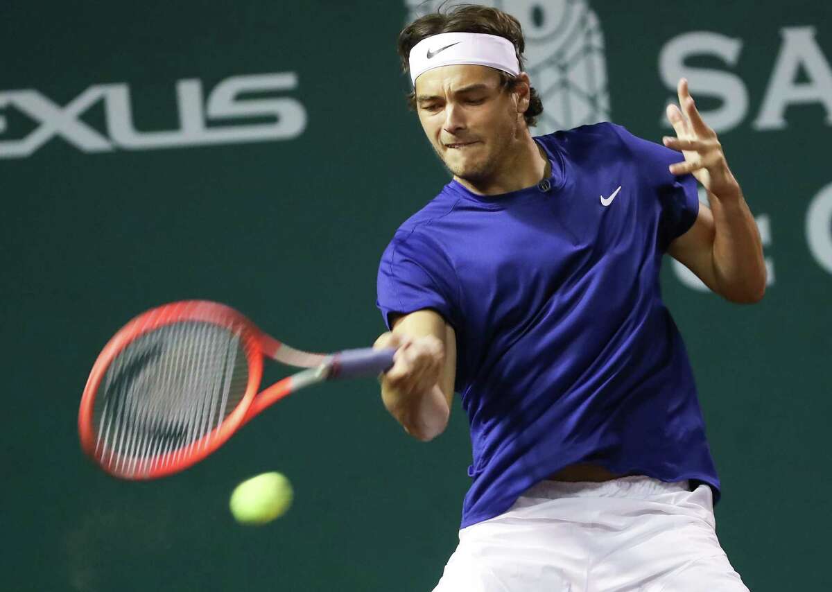 Taylor Fritz, USA, returns a hit from Alejandro Tabilo, CHI, during the second round of the Fayez Sarofim & Co. U.S. Men’s Clay Court Championship at River Oaks Country Club in Houston on Thursday, April 7, 2022. Fritz won the match 6-1, 6-4.
