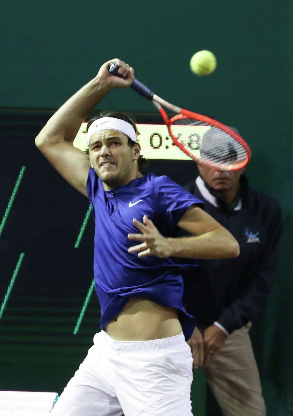 Taylor Fritz, USA, returns a hit from Alejandro Tabilo, CHI, during the second round of the Fayez Sarofim & Co. U.S. Men’s Clay Court Championship at River Oaks Country Club in Houston on Thursday, April 7, 2022. Fritz won the match 6-1, 6-4.
