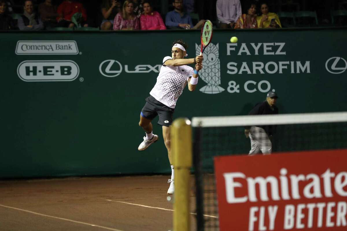 Alejandro Tabilo, CHI, and Taylor Fritz, USA, compete in the second round of the Fayez Sarofim & Co. U.S. Men’s Clay Court Championship at River Oaks Country Club in Houston on Thursday, April 7, 2022. Fritz won the match 6-1, 6-4.