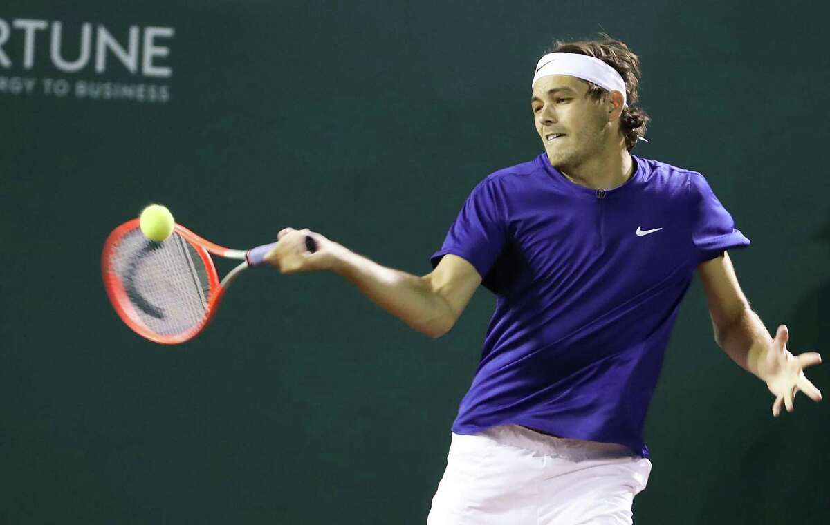 Taylor Fritz, USA, returns a hit from Alejandro Tabilo, CHI, during the second round of the Fayez Sarofim & Co. U.S. Men’s Clay Court Championship at River Oaks Country Club in Houston on Thursday, April 7, 2022. Fritz won the match 6-1, 6-4.