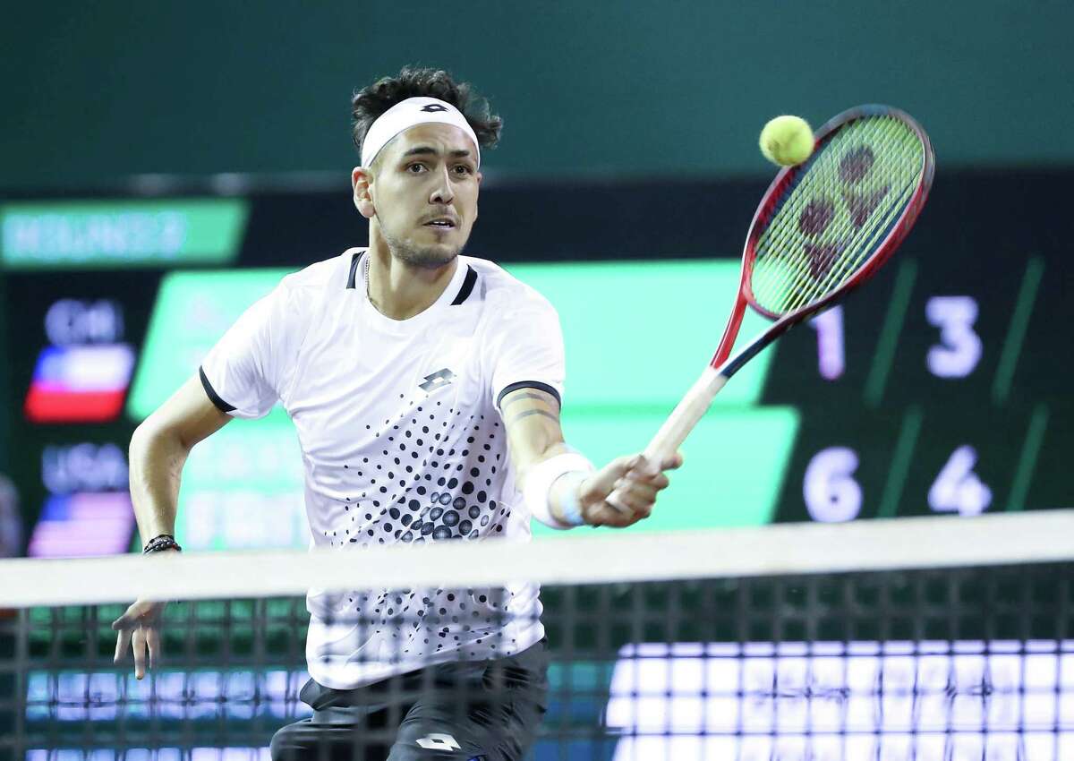 Alejandro Tabilo, CHI, returns a hit from Taylor Fritz, USA, during the second round of the Fayez Sarofim & Co. U.S. Men’s Clay Court Championship at River Oaks Country Club in Houston on Thursday, April 7, 2022. Fritz won the match 6-1, 6-4.