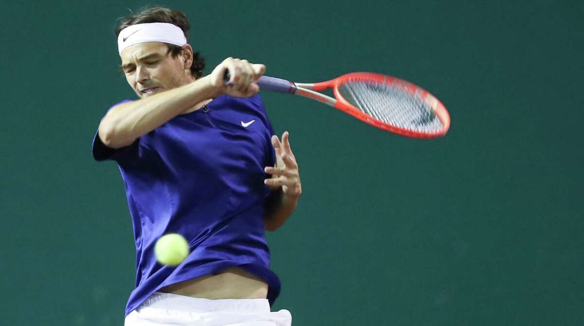 Taylor Fritz, USA, returns a hit from Alejandro Tabilo, CHI, during the second round of the Fayez Sarofim & Co. U.S. Men’s Clay Court Championship at River Oaks Country Club in Houston on Thursday, April 7, 2022. Fritz won the match 6-1, 6-4.