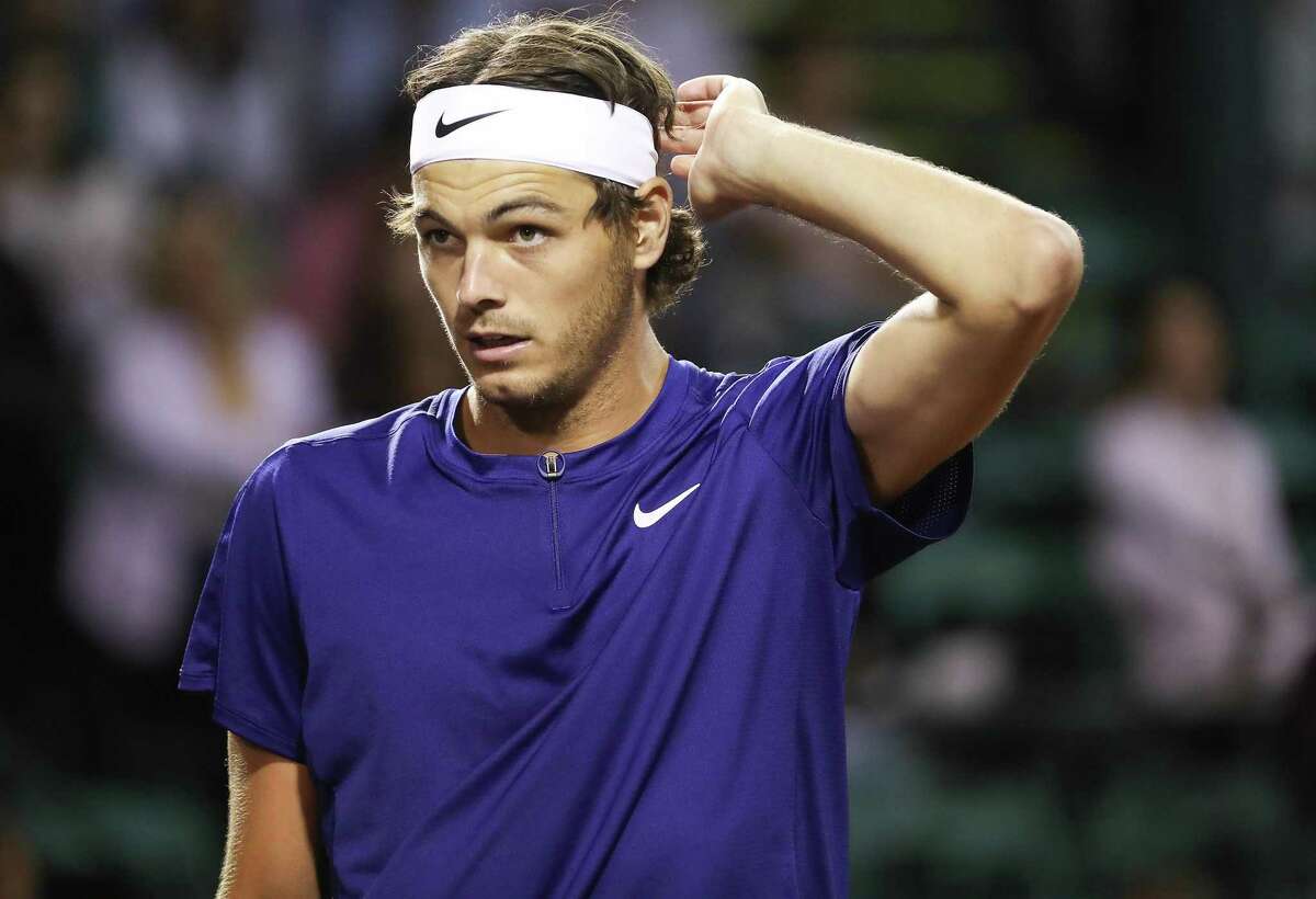 Taylor Fritz, USA, pauses between games against Alejandro Tabilo, CHI, during the second round of the Fayez Sarofim & Co. U.S. Men’s Clay Court Championship at River Oaks Country Club in Houston on Thursday, April 7, 2022. Fritz won the match 6-1, 6-4.