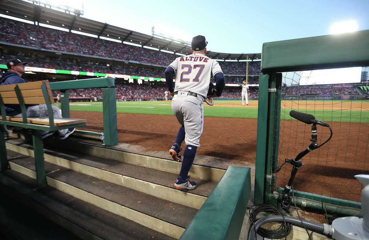 Houston Astros second baseman Jose Altuve (27) heads out to the field a during the first inning of opening day at Angel Stadium on Thursday, April 7, 2022 in Anaheim.