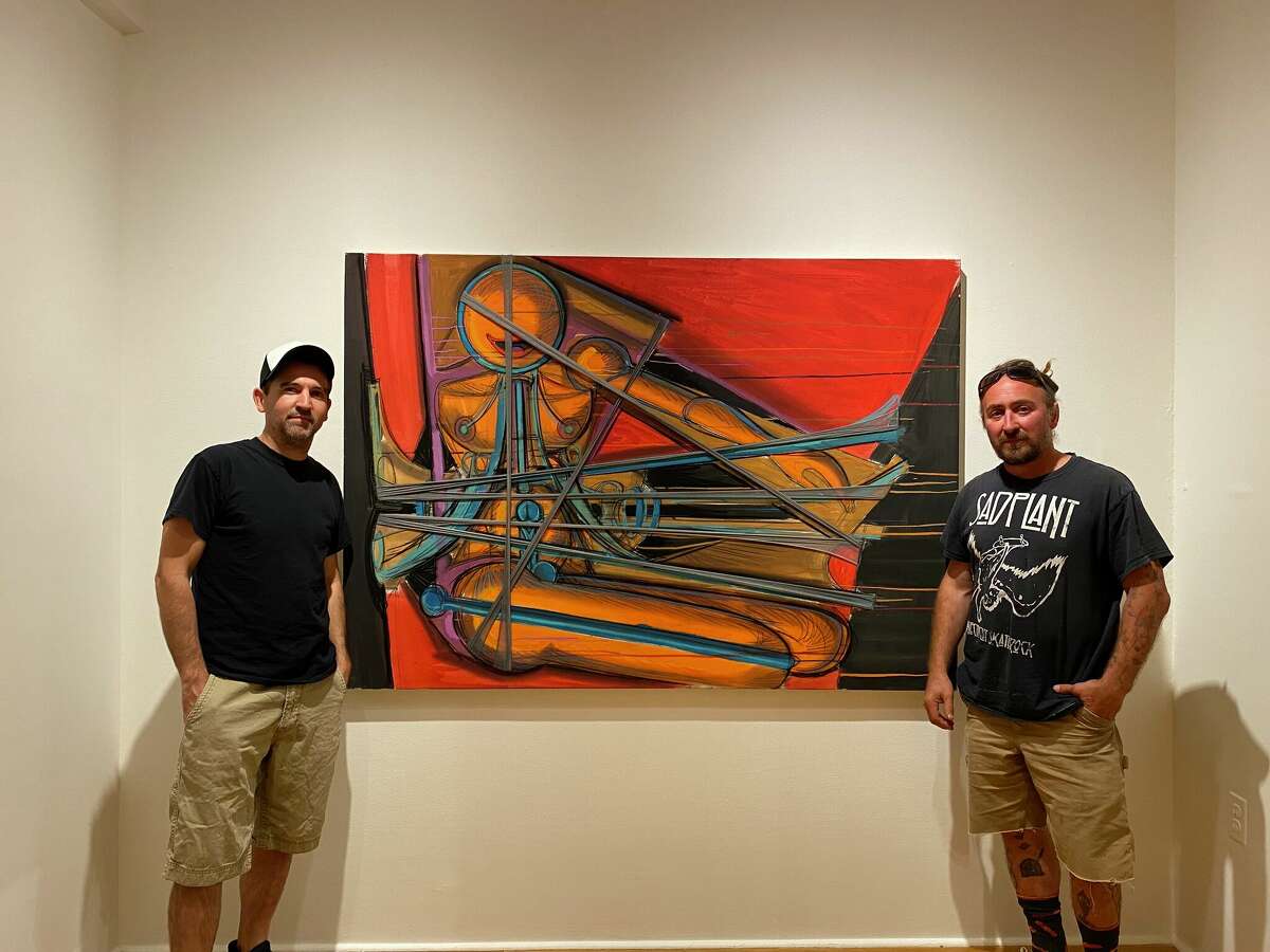 Jared Whipple and George Martin, a car mechanic and contractor who found a large art collection from Francis Hines in a dumpster in Watertown back in 2017.