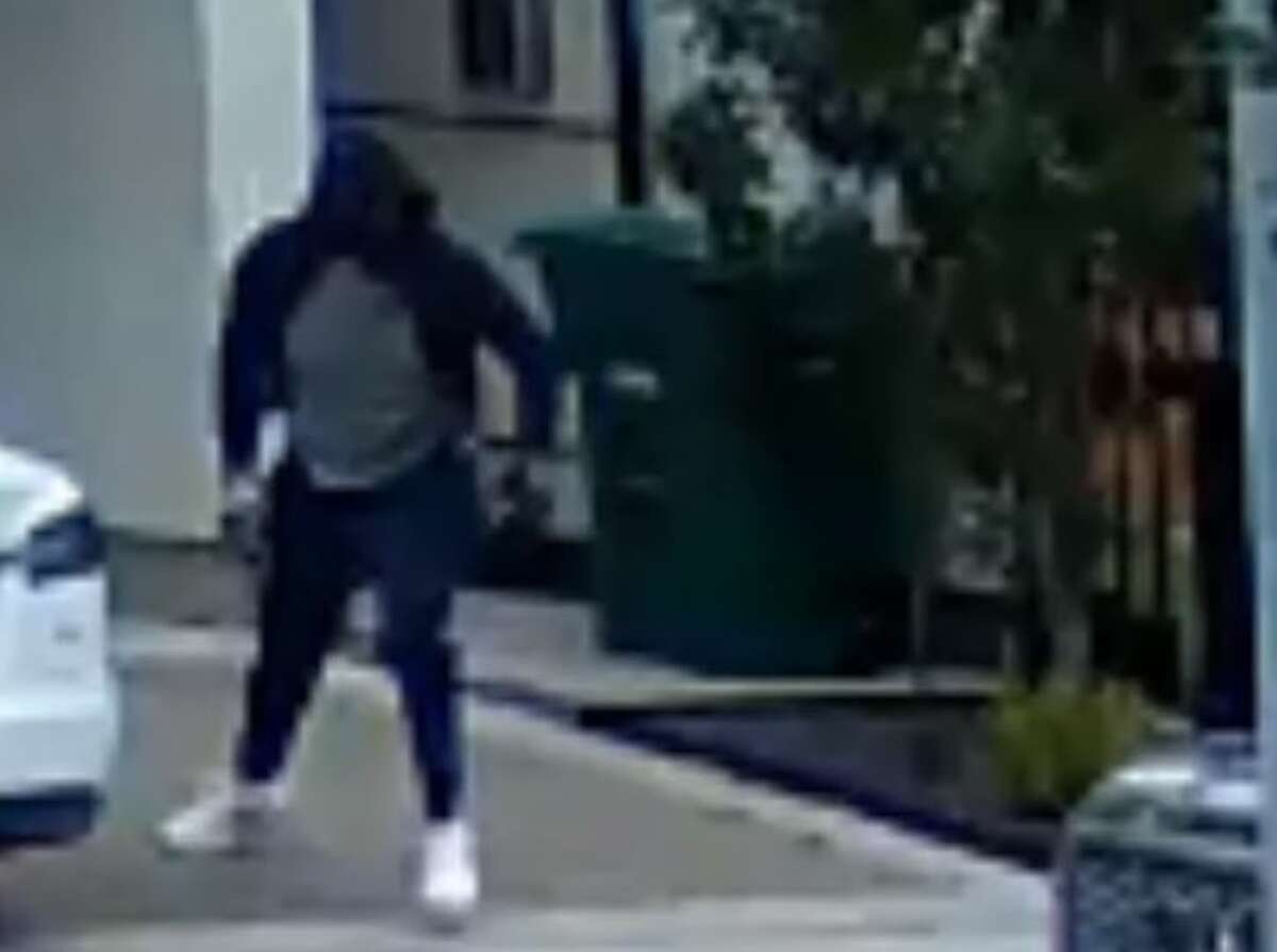 Houston police are searching for a suspect seen on surveillance video robbing a man outside his relative's home at 11:30 am March 8 in the Fourth Ward. 