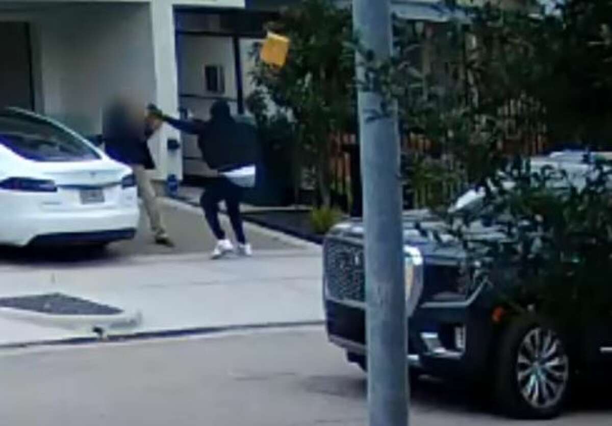 Houston police are searching for a suspect seen on surveillance video robbing a man outside his relative's home at 11:30 am March 8 in the Fourth Ward. 