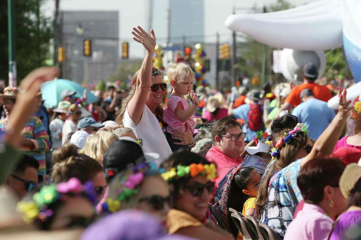 The crowd enjoys the 131st. Battle of Flowers Parade, Friday, April 8, 2022.