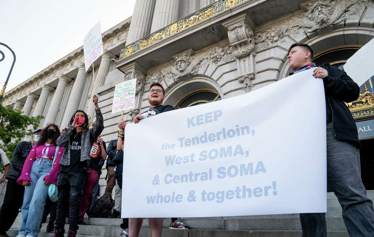 Protesters gather in front of S.F. City Hall on Wednesday in hopes of stopping the redistricting of their communities.