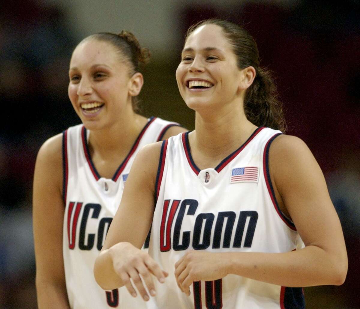 Connecticut's Diana Taurasi, left, and Sue Bird smile during the first half as they play against Old Dominion in the NCAA Mideast Regional championship game in Milwaukee in 2002.
