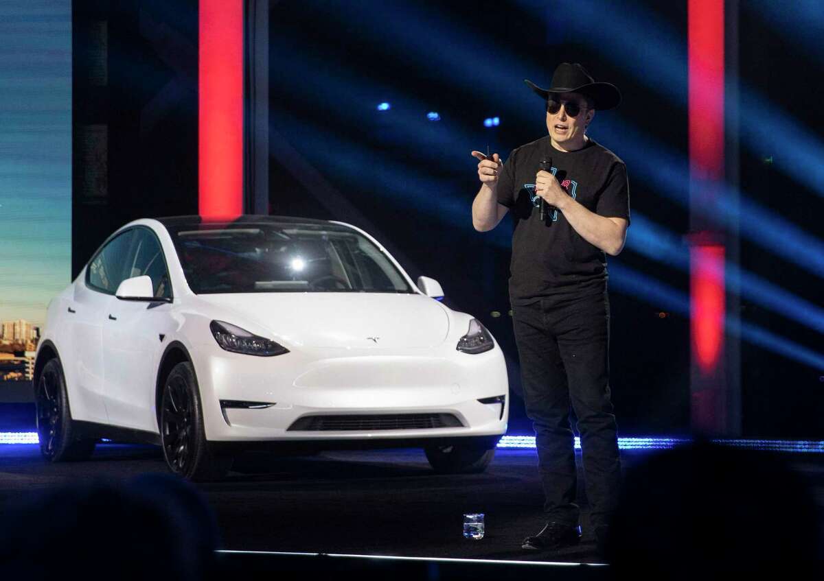 Tesla CEO Elon Musk speaks at the grand opening of the company’s $1.1 billion Tesla Giga Texas manufacturing facility in Austin last April. The EV maker is reportedly eyeing expansion of its production into Mexico.