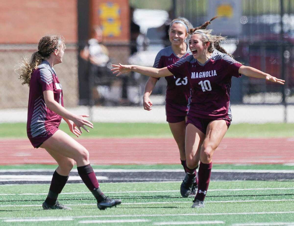 Magnolia’s Laney Gonzales (10) celebrates after her goal in the first half of a Region III-5A semifinal high school soccer match at Turner Stadium, Friday, April 8, 2022, in Humble.