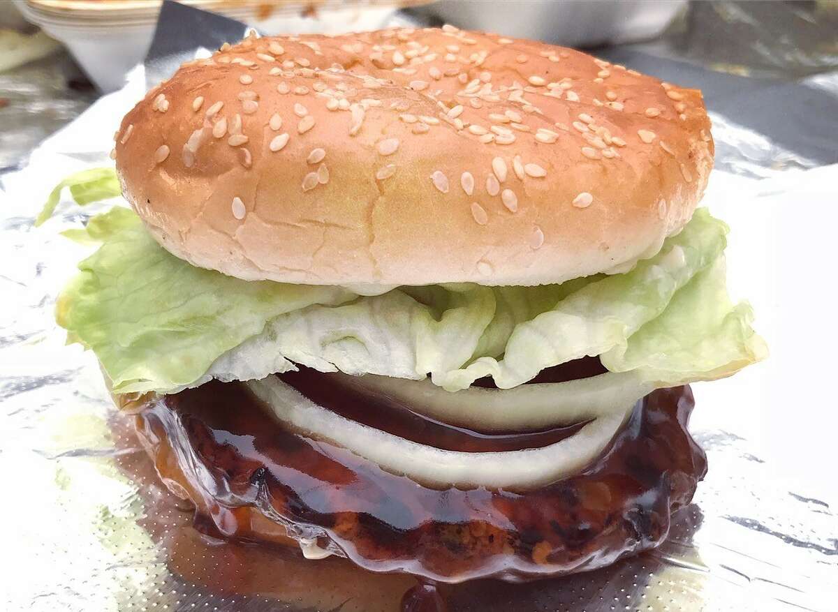 The popular Teri Burger from Kimochi's vendor booth is dressed with lettuce, tomatoes, onions, mayo and slathered with house-made teriyaki sauce. 