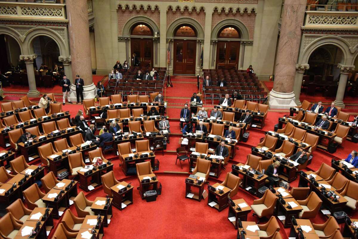 Assembly members debate on aspects of the 2023 state budget during session on Friday, April 8, 2022, at the Capitol in Albany, N.Y.