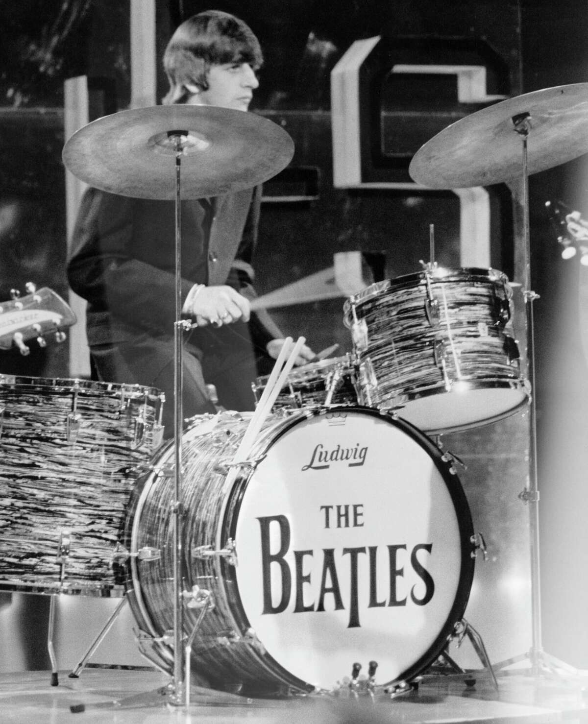 Ringo Starr of English rock and pop group The Beatles plays his Ludwig drum kit on stage during rehearsals for the ABC Television music television show 'Thank Your Lucky Stars' Summer Spin at Teddington Studios in London on 11th July 1964. 