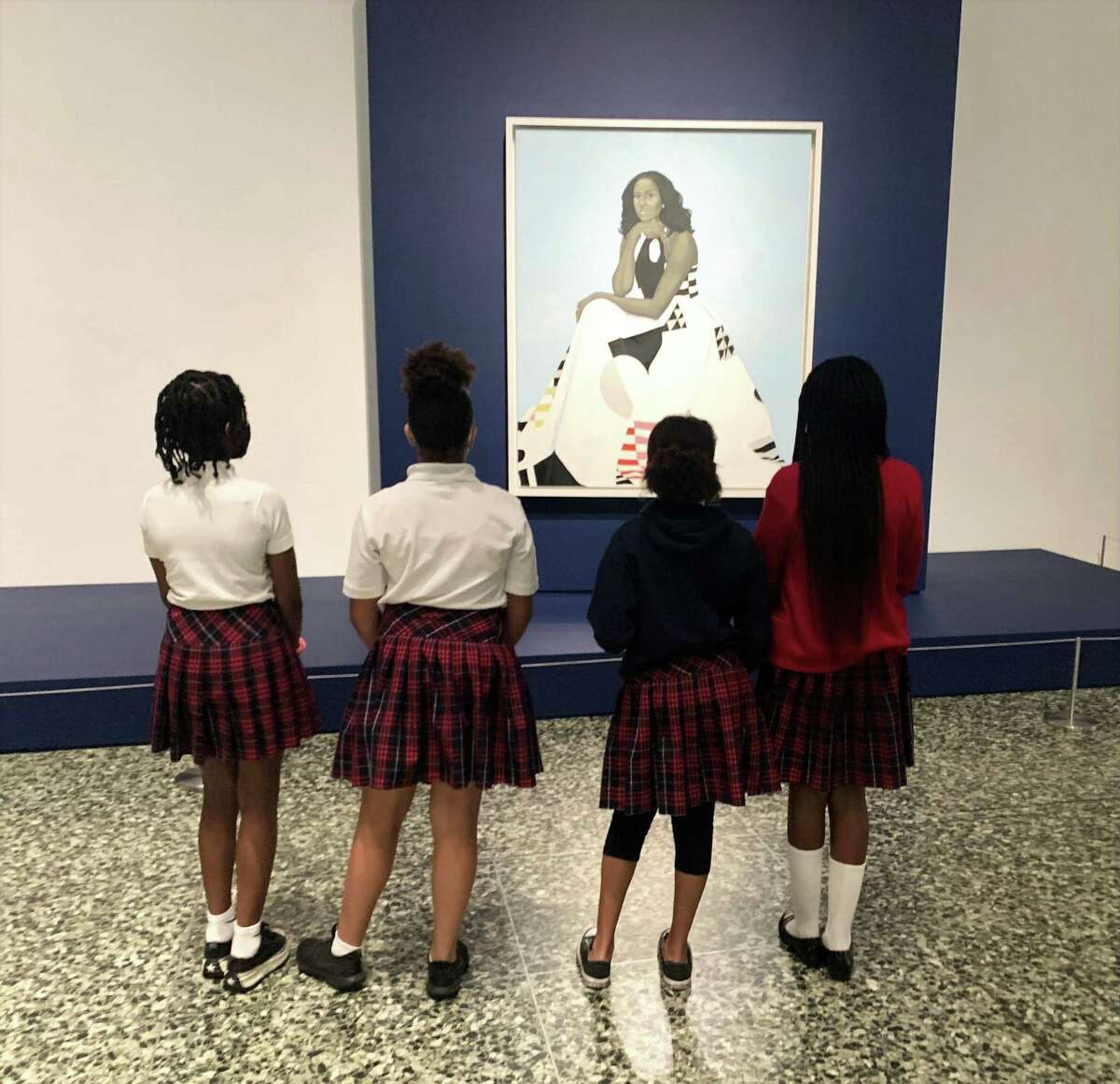 Students from The Imani School in Houston view the Obama Portrait exhibit at the Museum of Fine Arts, Houston.