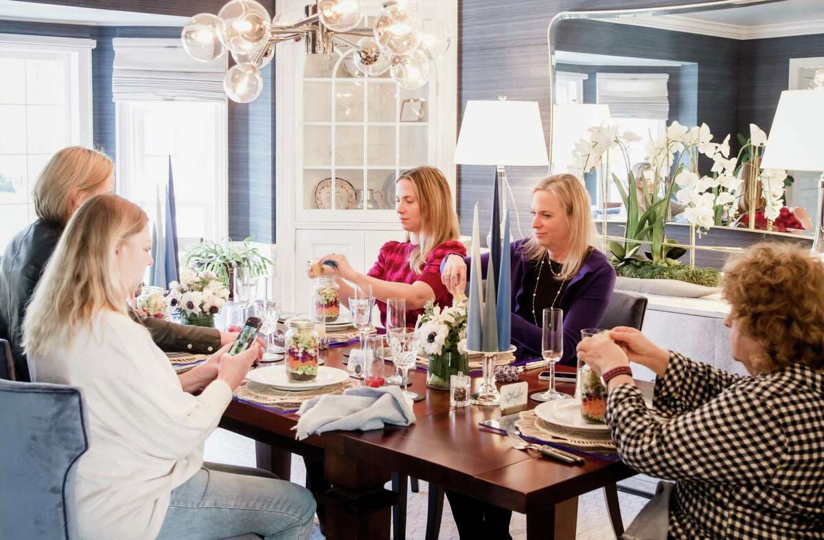 Four guests gathered at the New Canaan home of designer Jeanne Collins of JerMar Designs to discuss family, friends and a positive spirit along with Integrative Medicine physician Dr. Katie Takayasu. Shown are, from front left, Bridget Dowd of Neptune City, N.J.; Ashling Keenan of Darien; Jeanne Collin of New Canaan, Elaine Colangelo of Stratford. Not clearly shown in photo: Emily Hanlon of New Canaan.