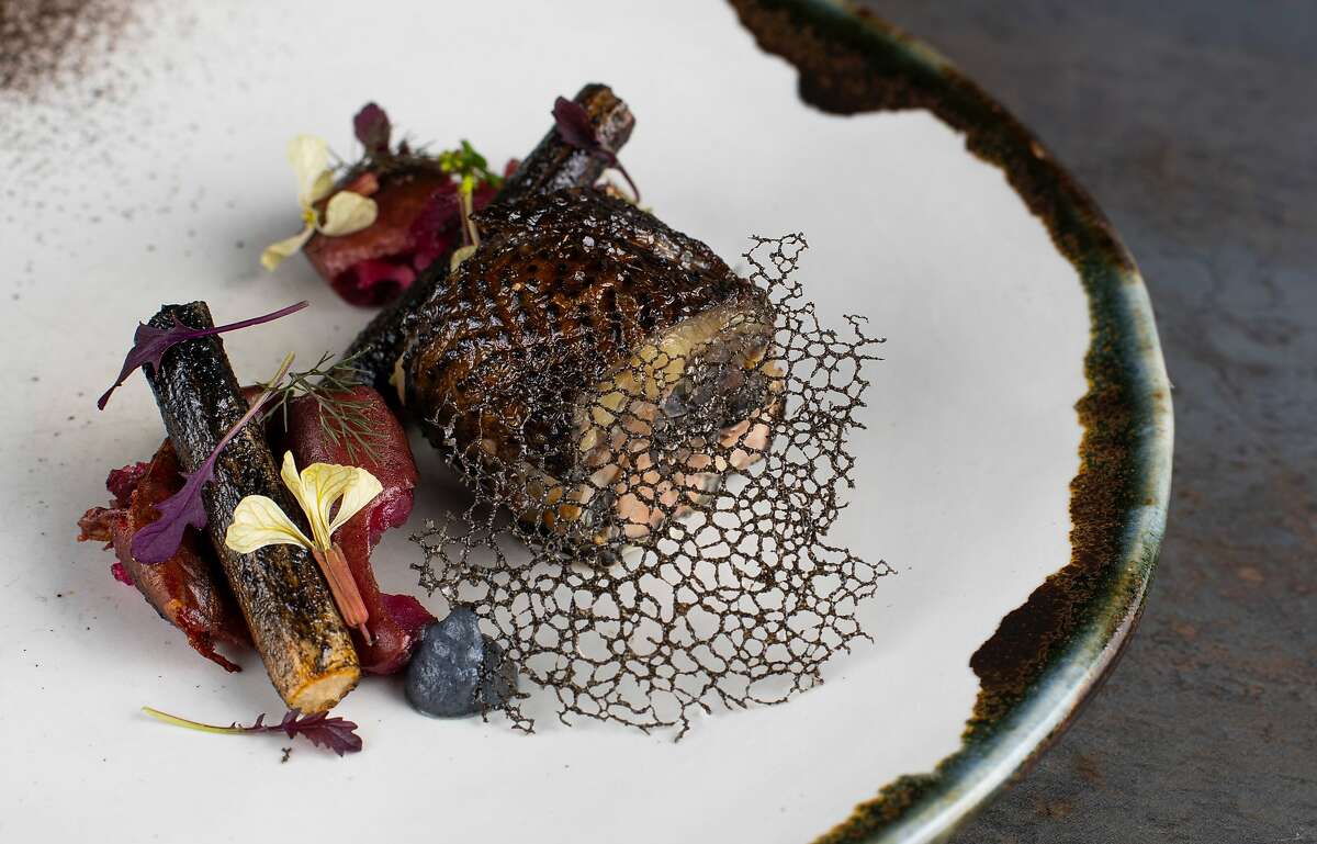 The "goth chicken" dish signifies the darkness in Nightbird chef Kim Alter's soul.