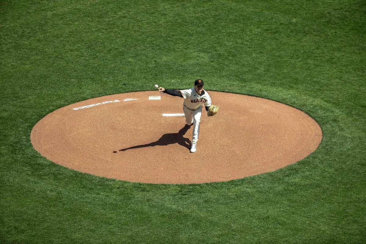 San Francisco Giants' Logan Webb delivers the first pitch during the first inning against Miami Marlins at Oracle Park in San Francisco, Calif. Friday, April 8, 2022.