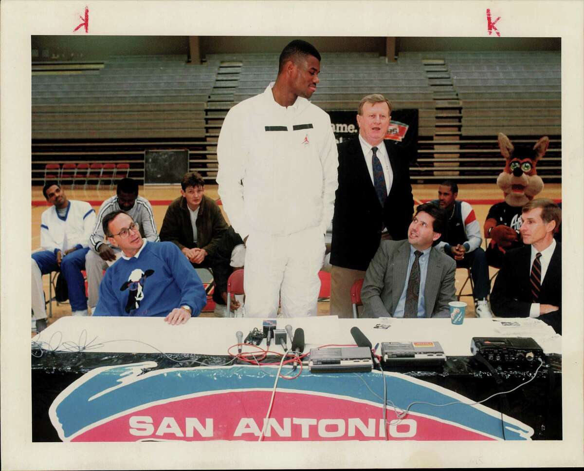 Red McCombs introduces David Robinson during a news conference after practice at the Incarnate Word College convocation center; San Antonio Spurs basketball