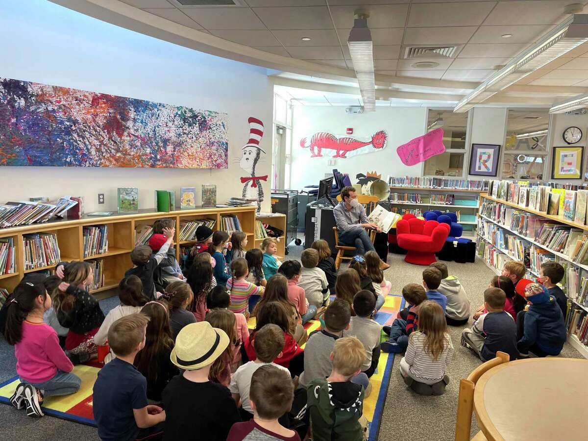 For the second year in a row, Ridgebury Elementary School has gotten students excited about language arts with its month-long Rex Readathon, named in honor of their canine mascot. Pictured, state Sen. Will Haskell reads to a group of students.