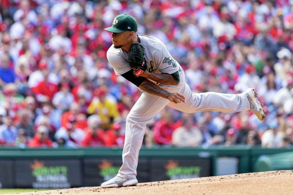 Oakland Athletics starting pitcher Frankie Montas (47) throws in the first inning of a baseball game against the Philadelphia Phillies, Friday, April 8, 2022, in Philadelphia. (AP Photo/Laurence Kesterson)