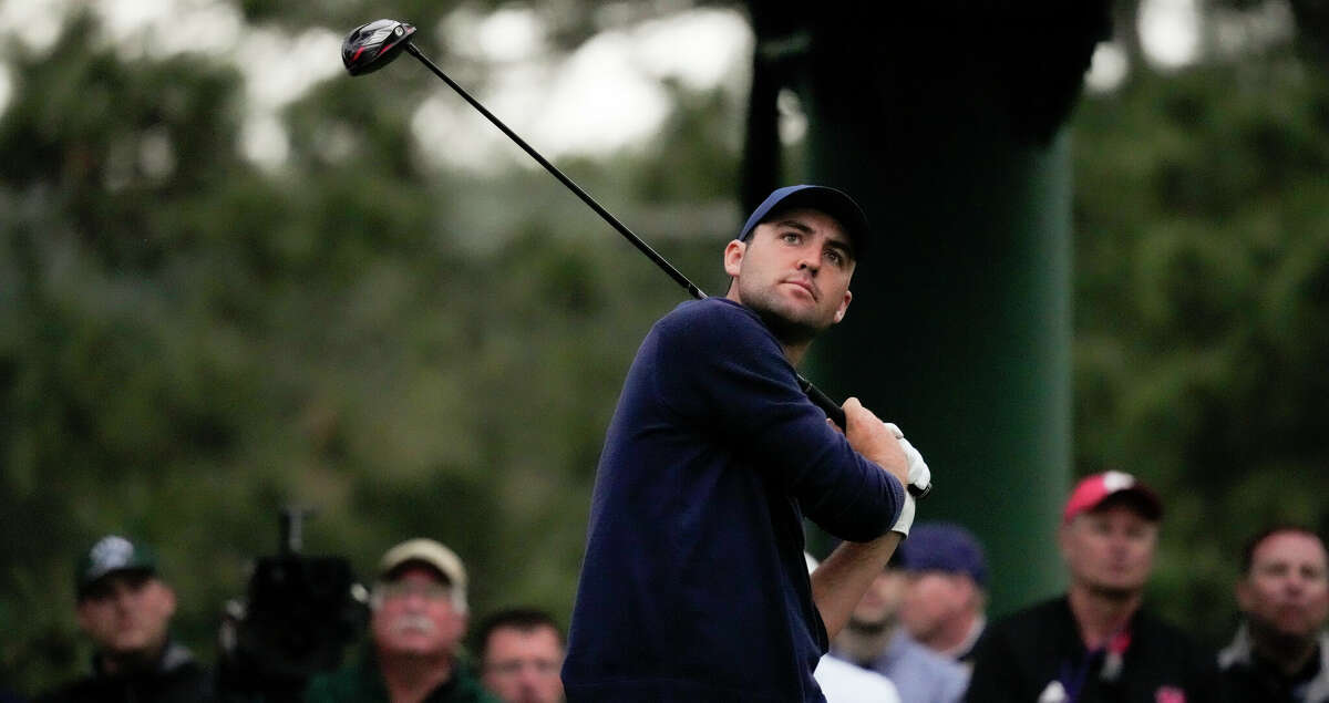 Scottie Scheffler on the 18th tee during the second round at the Masters golf tournament on Friday, April 8, 2022, in Augusta, Ga. (AP Photo/Charlie Riedel)