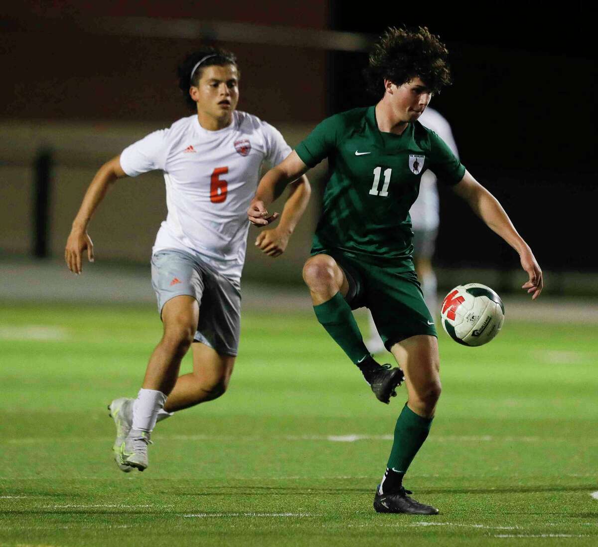 The Woodlands' Cody Tice (11), shown here last week, scored the game winning goal on a penalty kick in the second overtime Friday night against Mansfield Lake Ridge.