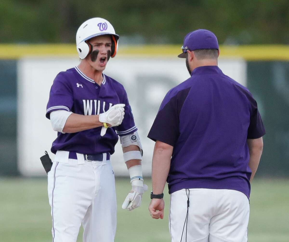Logan Wilson #11 of Willis reacts after hitting a 2-RBI single in the second inning of a District 13-6A high school baseball game at College Park High School, Friday, April 8, 2022, in The Woodlands.