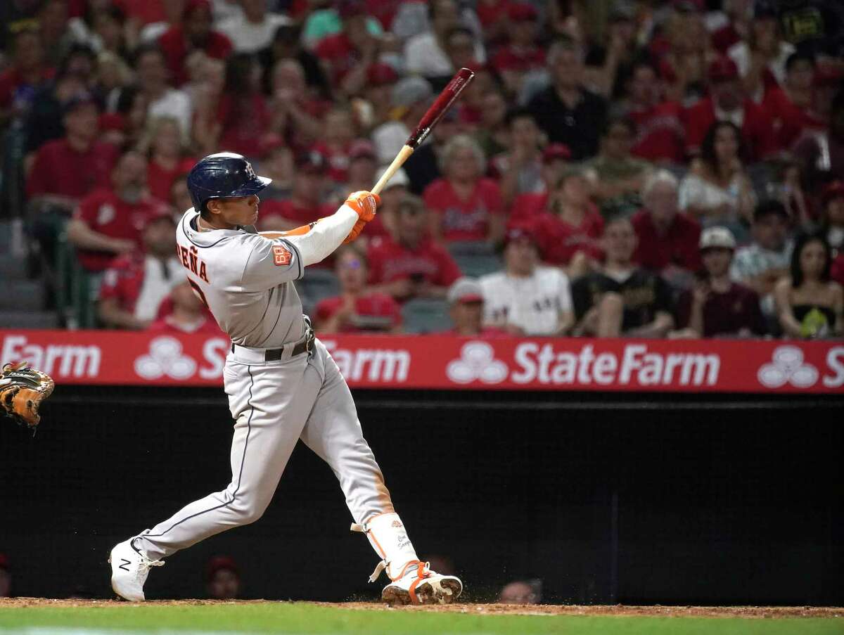 Houston Astros shortstop Jeremy Pena (3) hits his first Major League home run off of Los Angeles Angels Mike Mayers during the seventh inning during the seventh inning of an MLB baseball game at Angel Stadium on Friday, April 8, 2022 in Anaheim.