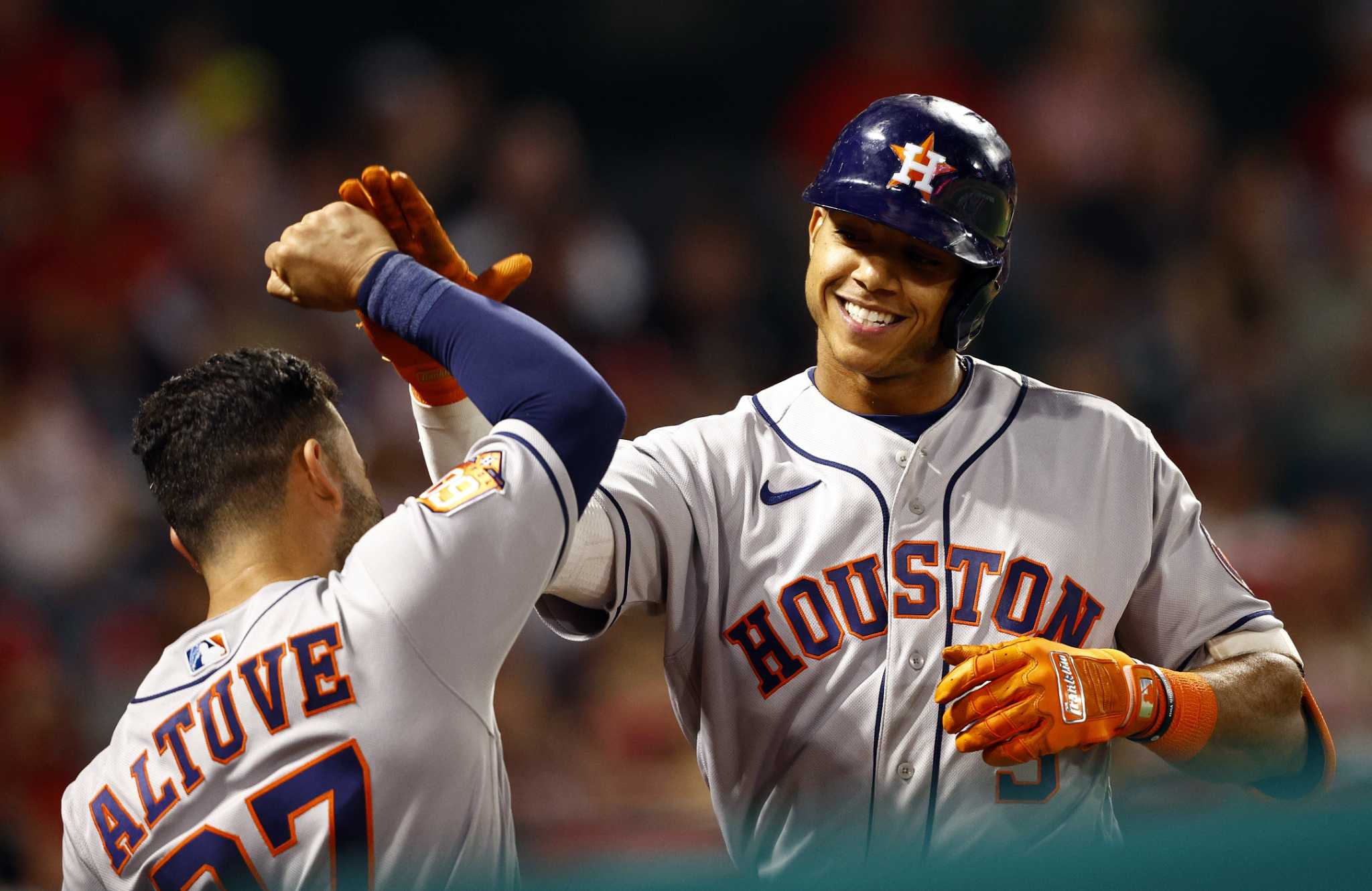 Peña homers with parents watching, Astros thump Angels 13-6