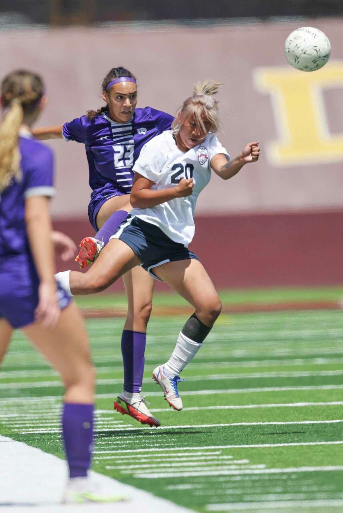 Atascocita midfielder Eagles Daniela Ortega (20) heads the ball against Ridge Point Panthers defender Kelsey Vaughn (23) in the first half in a Region III-6A semifinal girls playoff soccer game on April 8, 2022 at Abshire Stadium in Deer Park, TX.