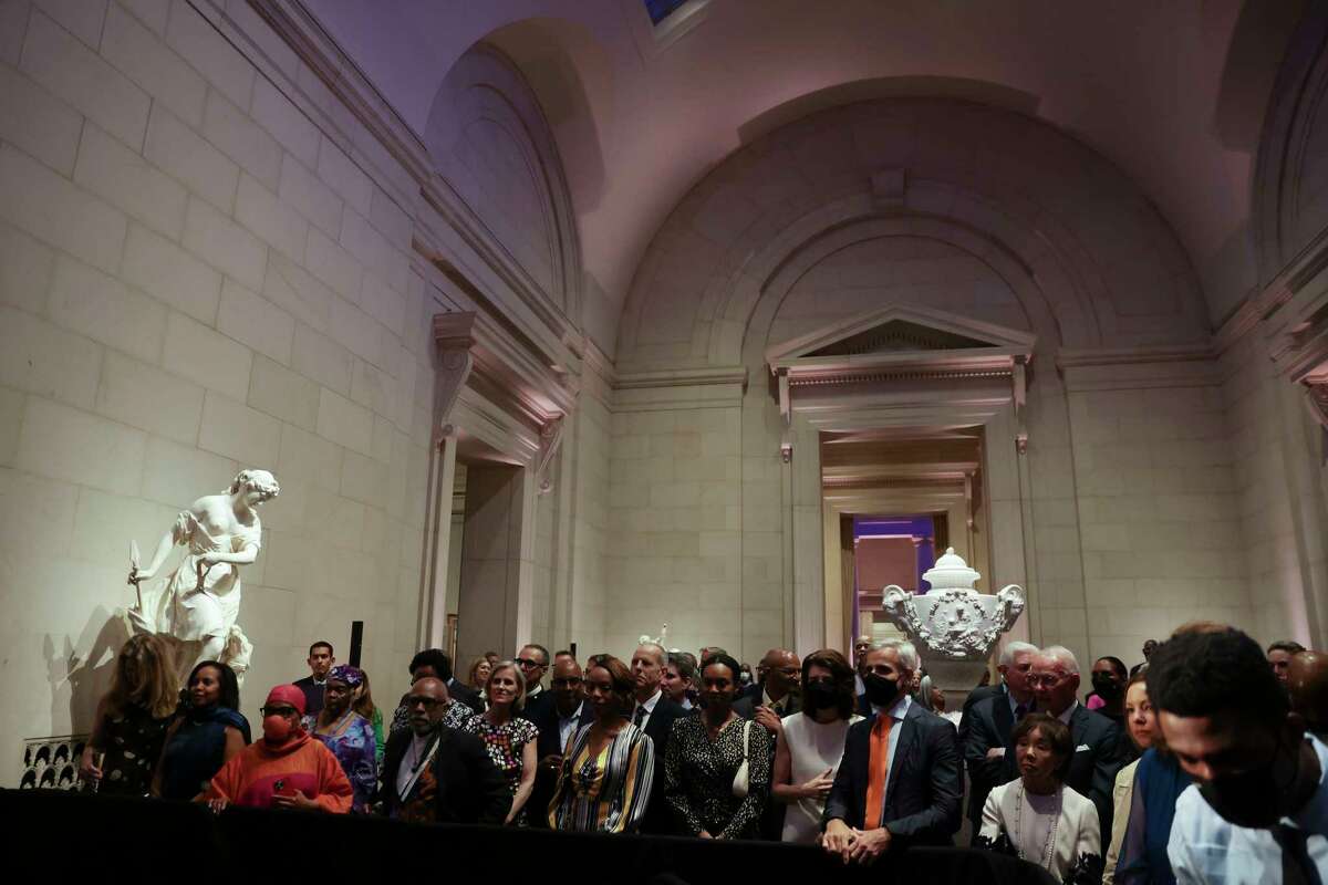 Guests listen to Vice President Kamala Harris speak at the opening of the Afro-Atlantic Histories exhibit at the Smithsonian's National Gallery of Art Thursday night.
