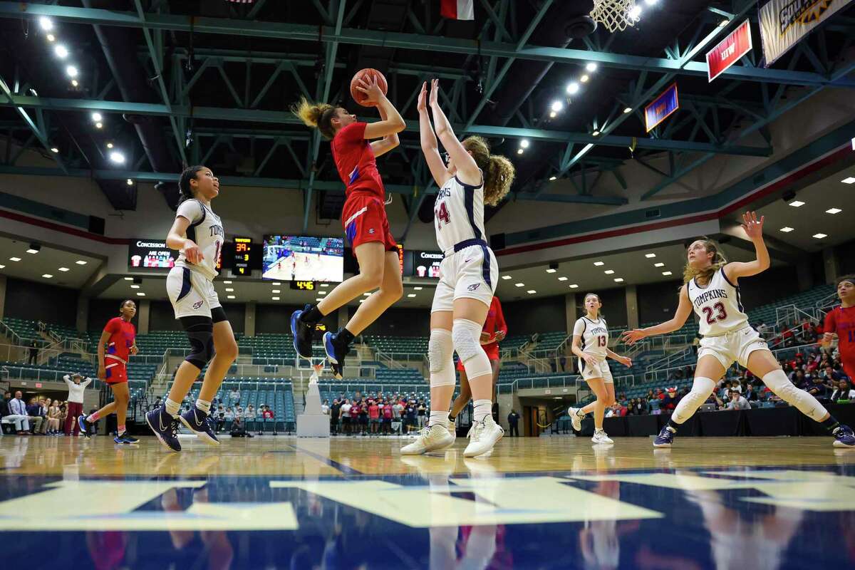 Dulles forward Dai dai Powell shoots during the second half of a Region III-6A quarterfinals game between the Tompkins Falcons and the Dulles Vikings, Tuesday, Feb. 22, 2022, at the Merrell Center in Katy.