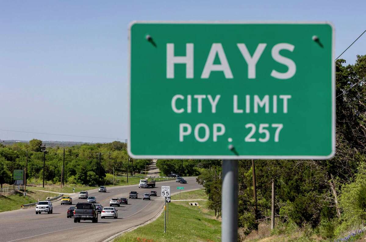 The cars run Friday, April 8, 2022 on FM 1626 in the town of Hays in far northern Hays County.  MileStone Community Builders is planning a mixed-use development called Hays Commons that will sit in both the extraterritorial jurisdictions of the City of Austin and Hays.