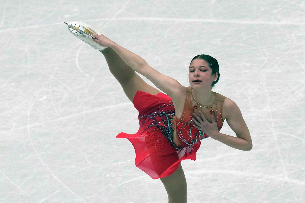 Alysa Liu, of the United States, performs in the women short program at the Figure Skating World Championships in Montpellier, south of France, Wednesday, March 23, 2022. (AP Photo/Francisco Seco)