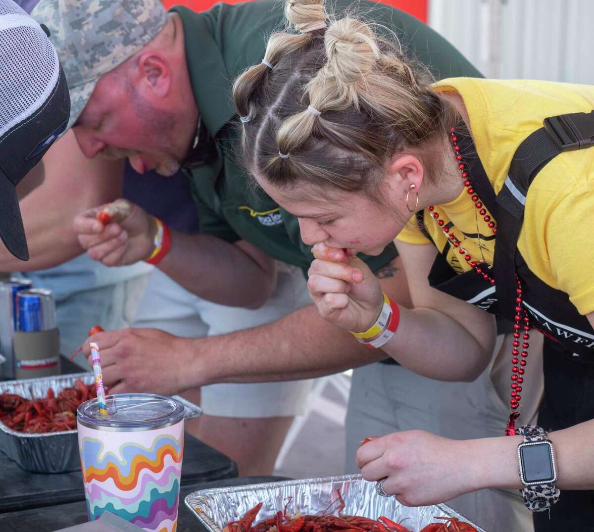 A crawfish eating contest only makes up part of Saturday's mudbug festivities at The Destination.  File photo: Contestants dig in to their 3 lbs. of crawfish during the crawfish eating contest as thousands of crawfish lovers came out for the 1st Crawfish Cook-off 04/09/2020 at The Tailgate. Tim Fischer/Reporter-Telegram