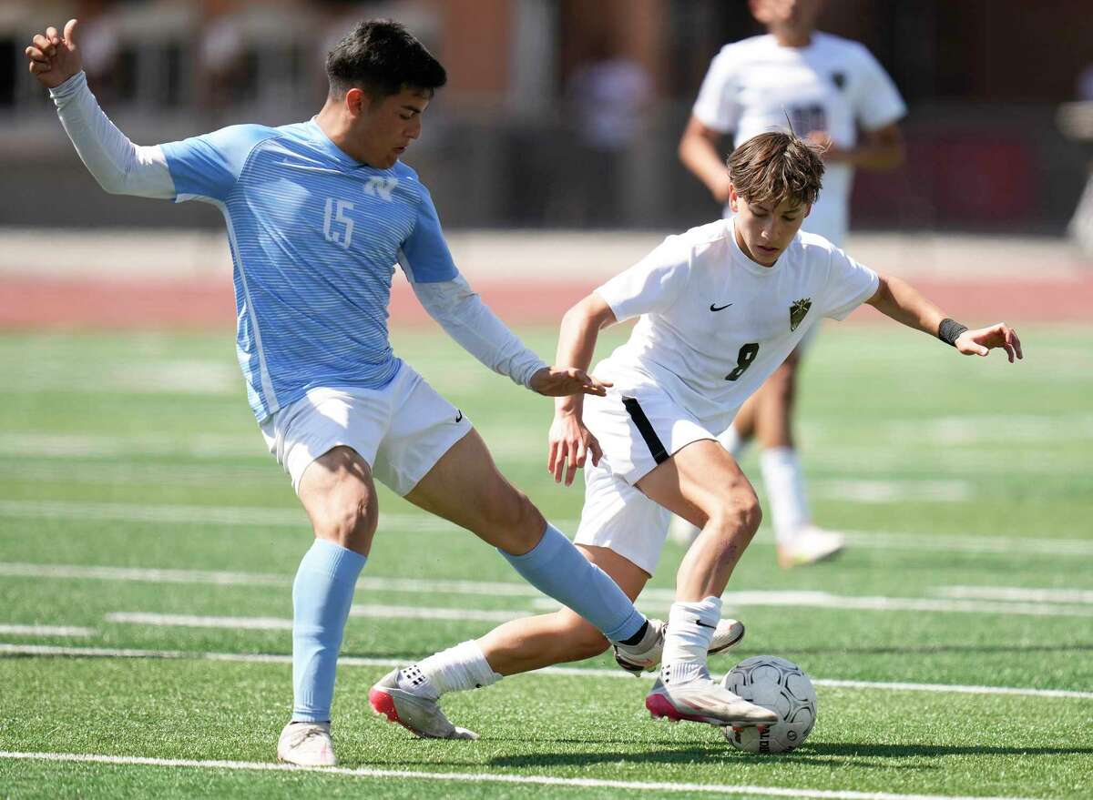 Jordan's Marcelo Ojeda, right, dribbles as Northeast Early College's Angel Perez defends during the second half of the Region III-5A final high school soccer playoff game, Saturday, April 9, 2022, in Humble, TX.