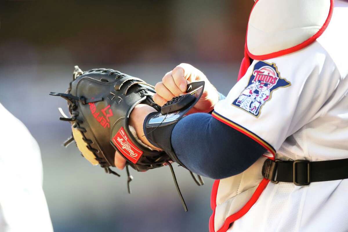 MINNEAPOLIS, MN - APRIL 08: A view of the PitchCom system used by Ryan Jeffers #27 of the Minnesota Twins in the second inning of the game against the Seattle Mariners on Opening Day at Target Field on April 8, 2022 in Minneapolis, Minnesota. (Photo by David Berding/Getty Images)
